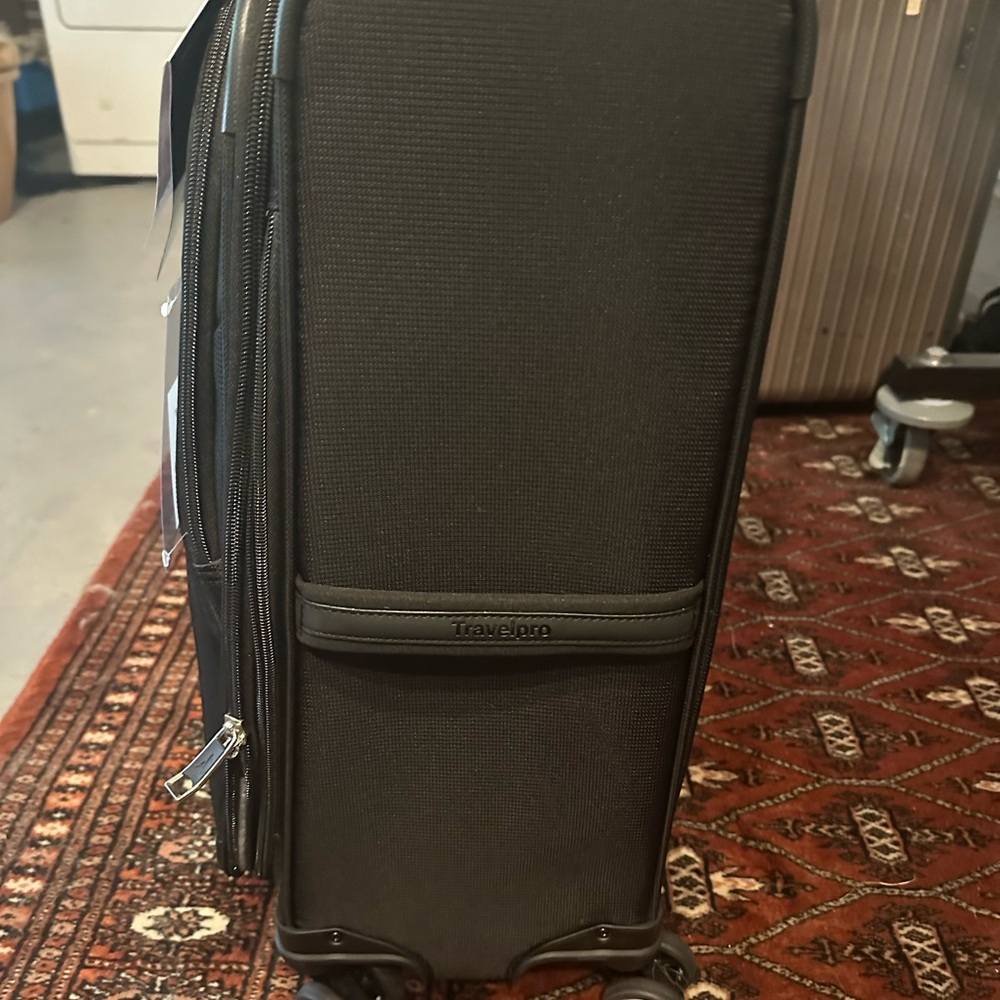 TravelPro Walk About 6 ultralight spinner expandable carryon. NWT